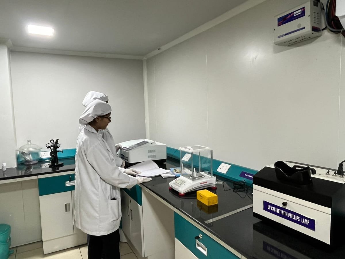 Analytical balance & UV cabinet at the Stenkem Biolife quality control laboratory, Karnal.